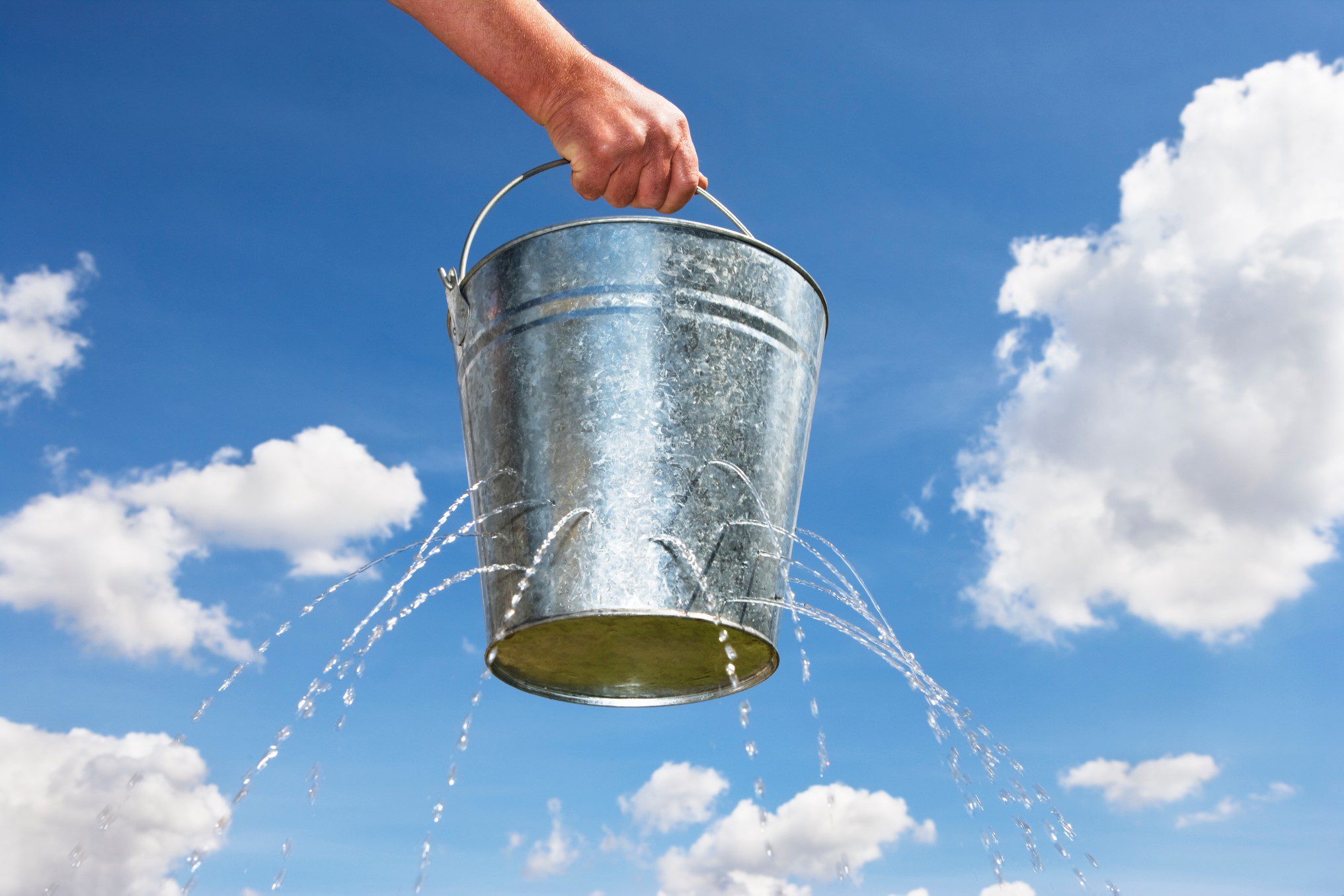 man-holding-bucket-with-holes-leaking-water_t20_0xZNjo