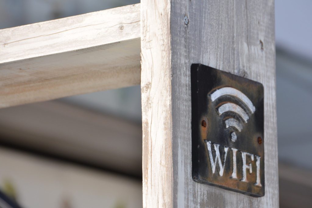 A wooden board with a rusted metal WiFi sign. Free WiFi can be hit or miss, especially in the evenings.