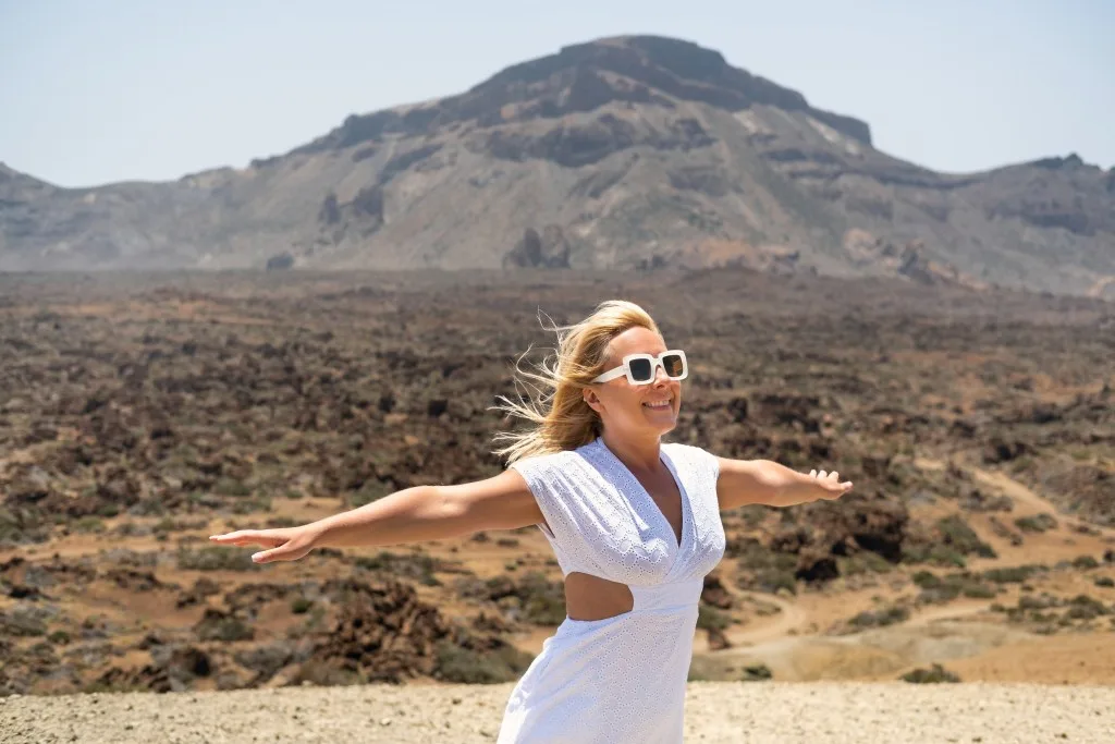 Woman posing in Hole-in-the-Ground crater.