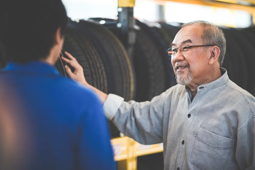 Man buying tires for his RV.