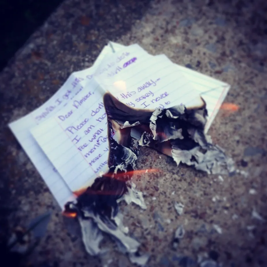 Letter being burned