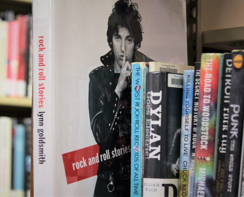 Bob Dyland book on book shelf.