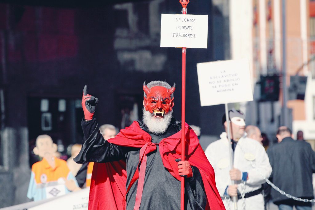 Man dressed up as the devil.