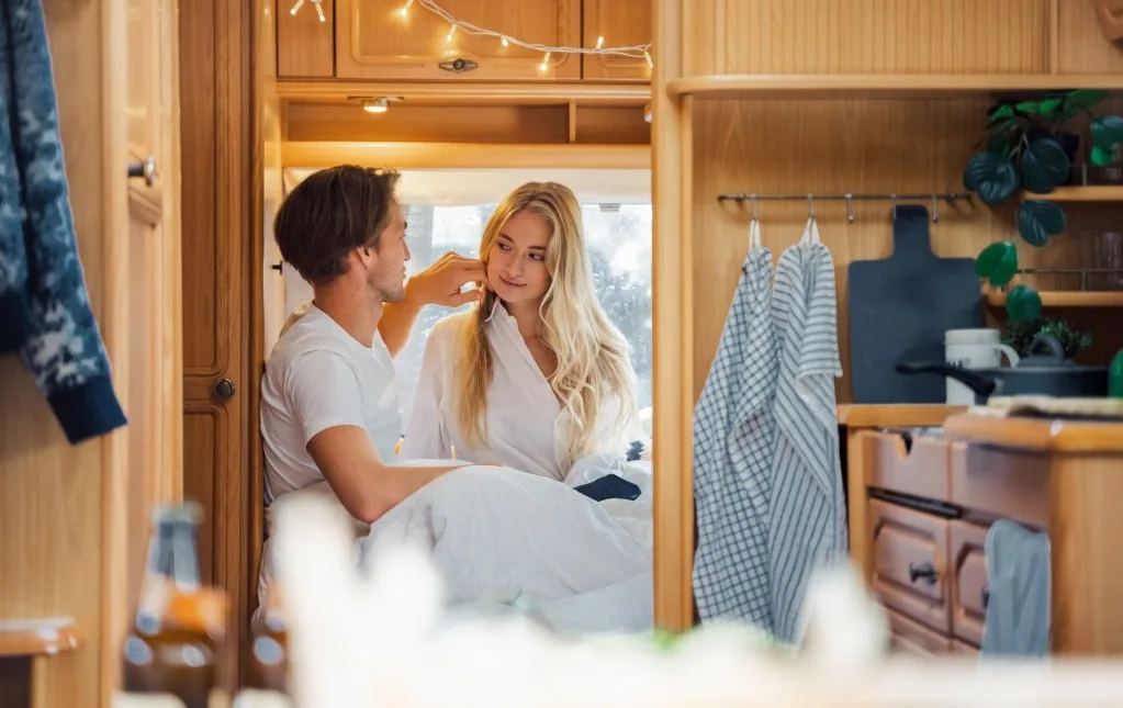 RV couple in the morning in bed.