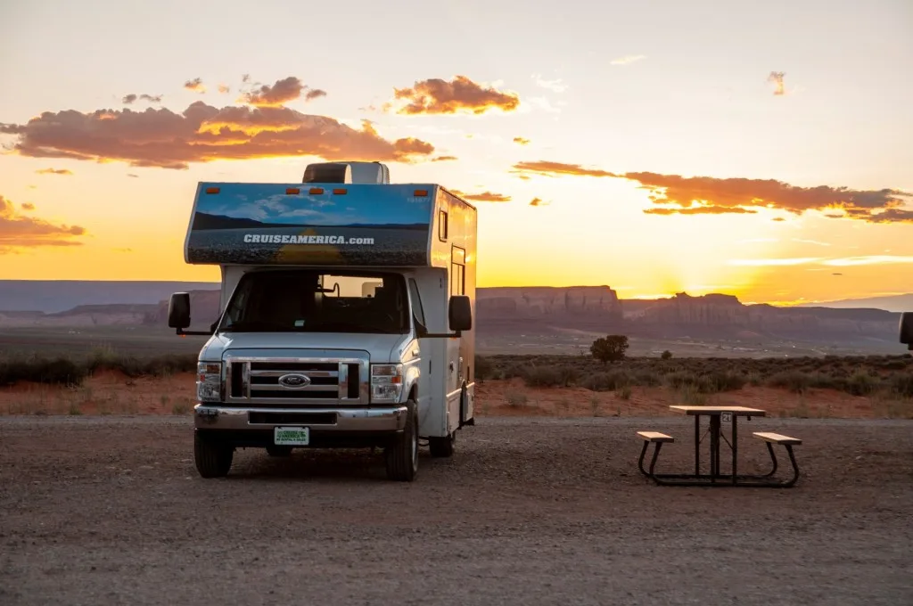 RV parked at sunset.