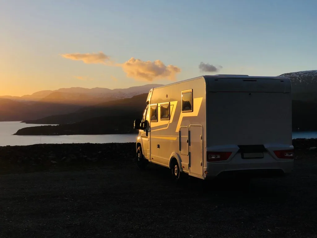 Rv parked at sunset.