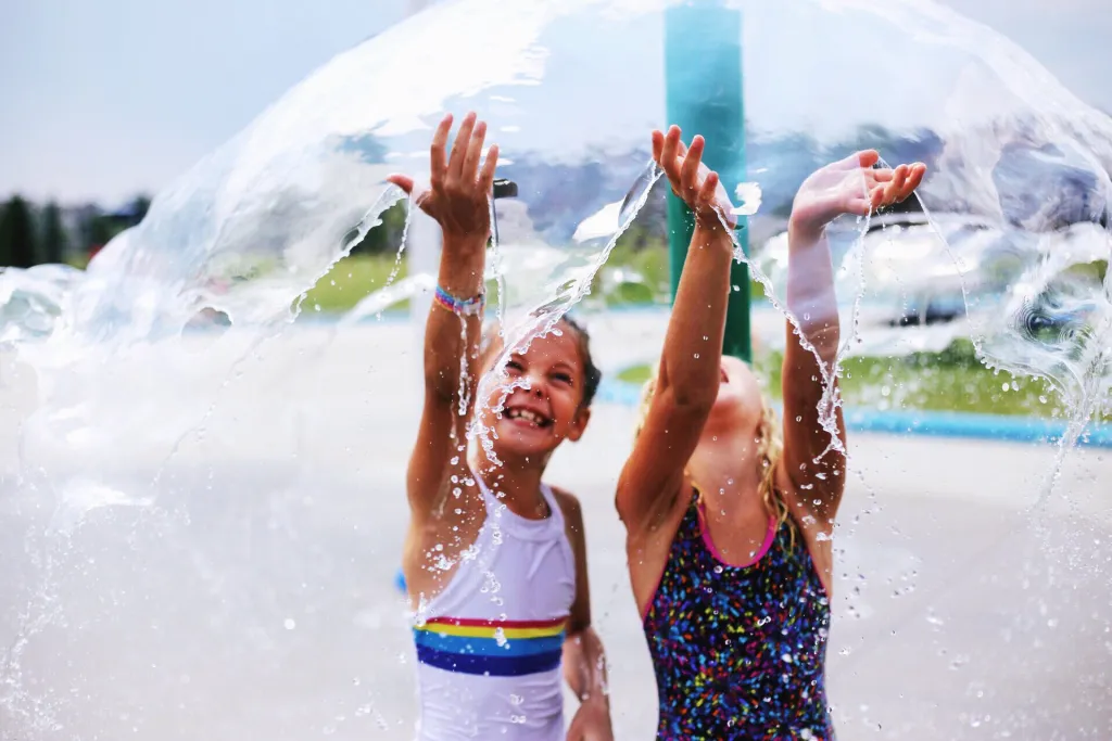 Two girls playing in waterpark