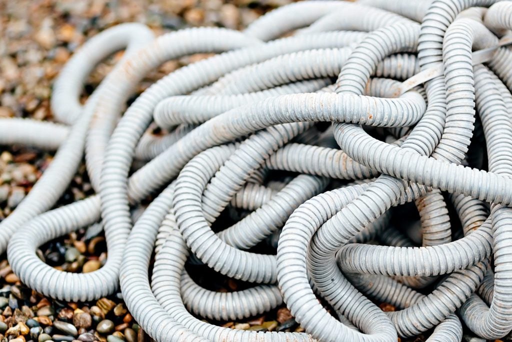 heated hoses in a pile.