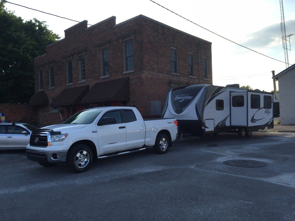 Truck towing RV in streets