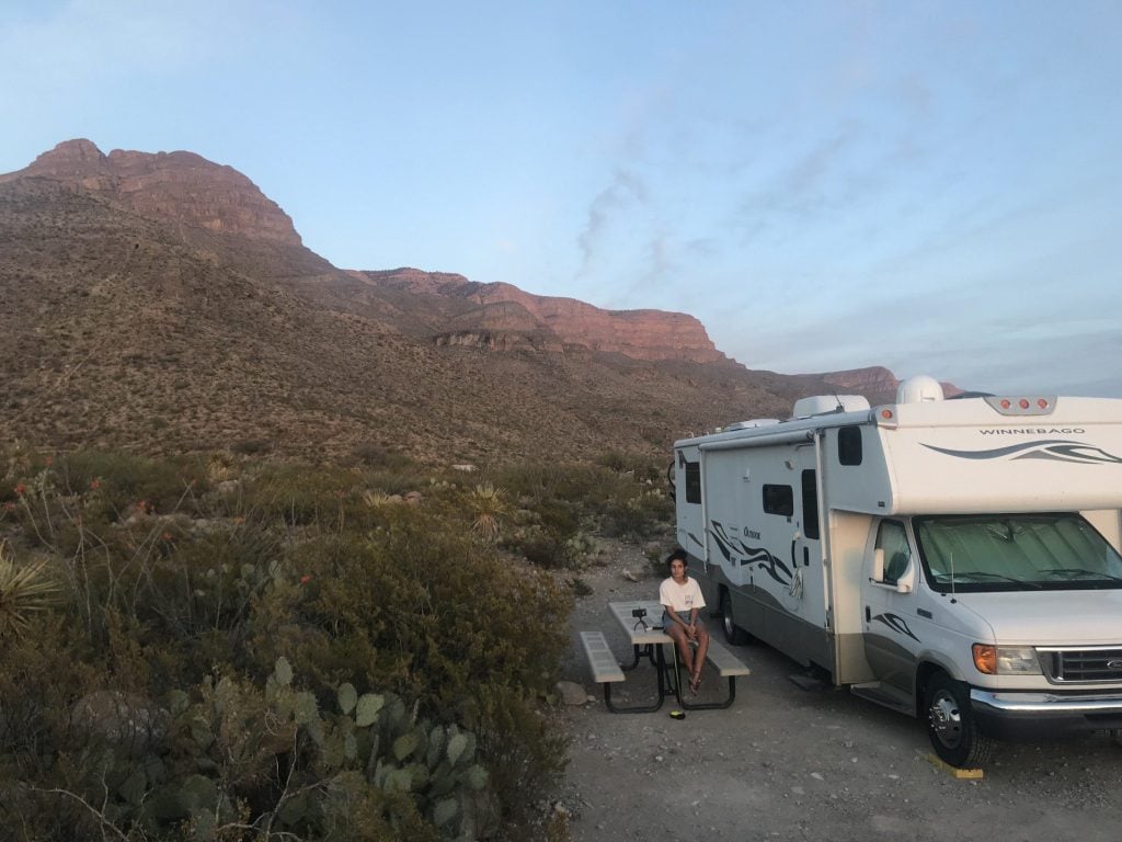 Woman posing in front of RV