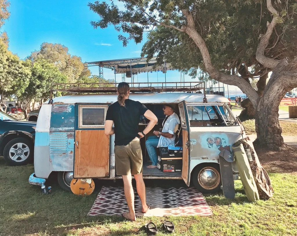 Two men parked in camper van