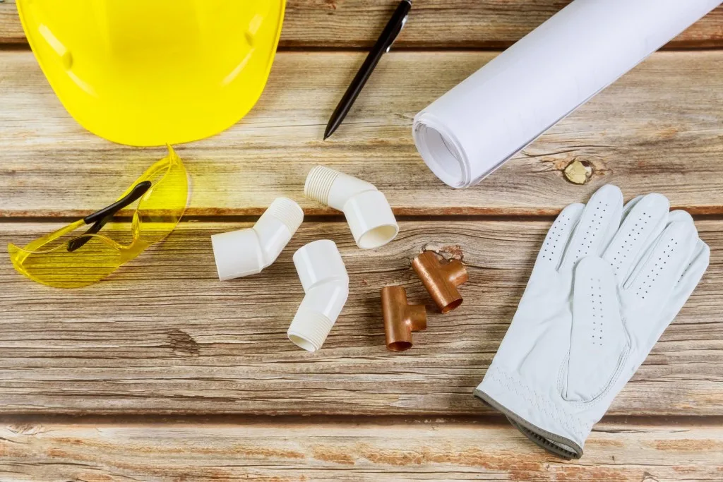 Plumbing equipment flat lay shot.