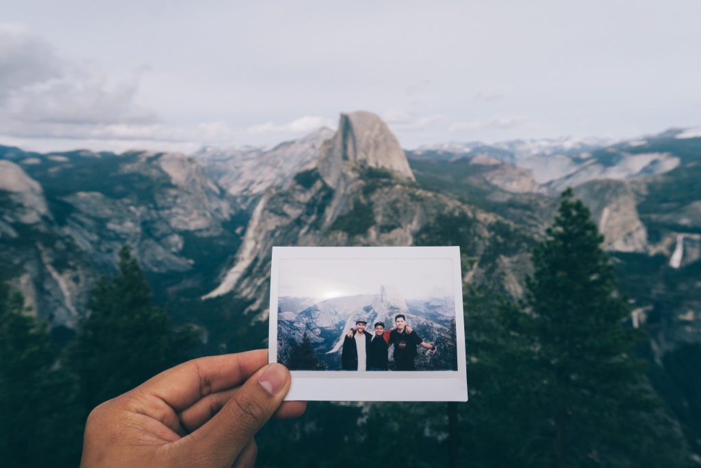 Polaroid of friends in a national park.