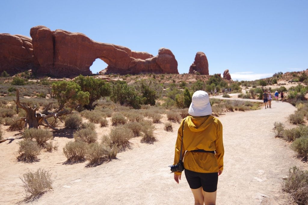 Woman hiking in Arches National Park.