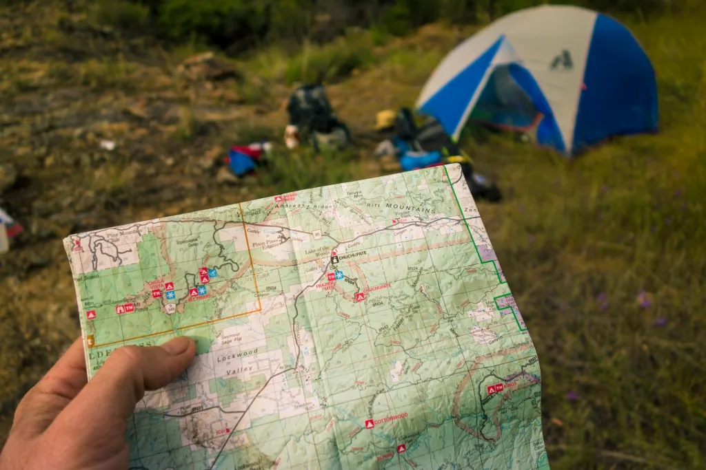 Campsite with camping gear displayed.
