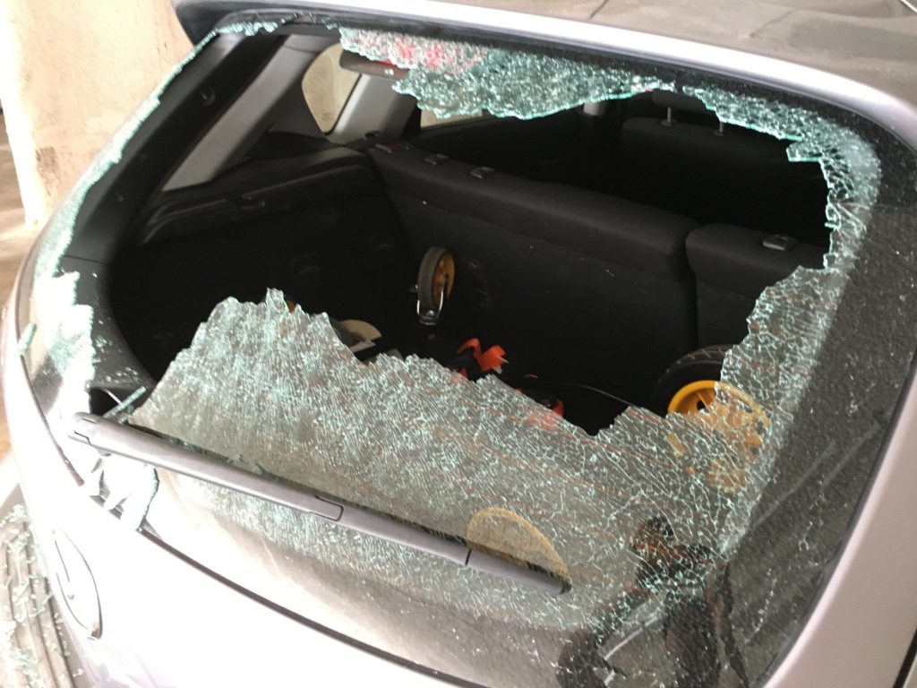 Car with broken window from car break-in