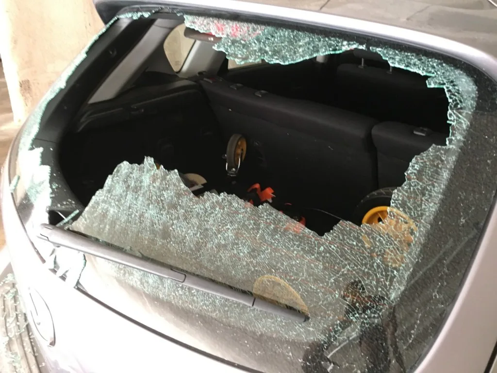 Car with broken window from car break-in