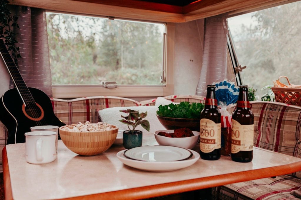 RV dining room table with food.