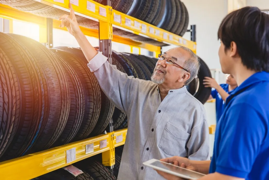 Man shopping for new tires