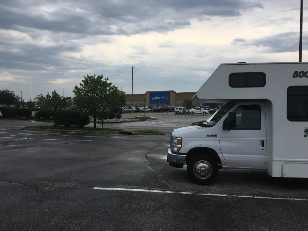 RV parked in Walmart parking lot.