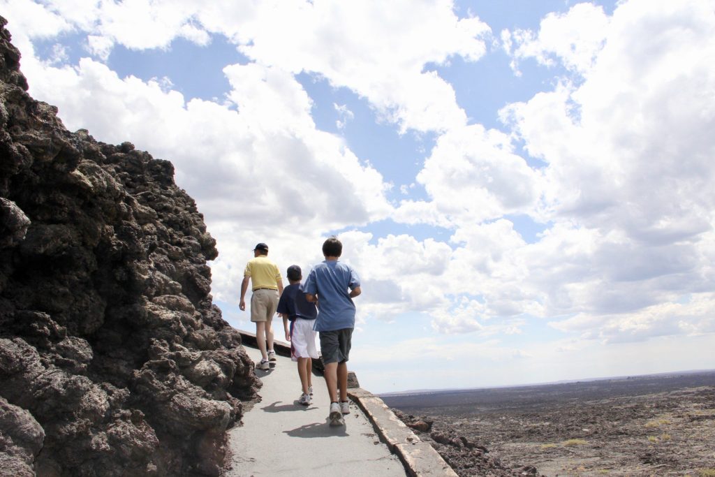 Family hiking in Craters of the Moon National Park