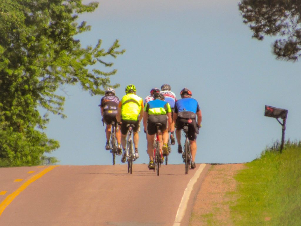 Group of cyclists going up Sugarloaf Mountain