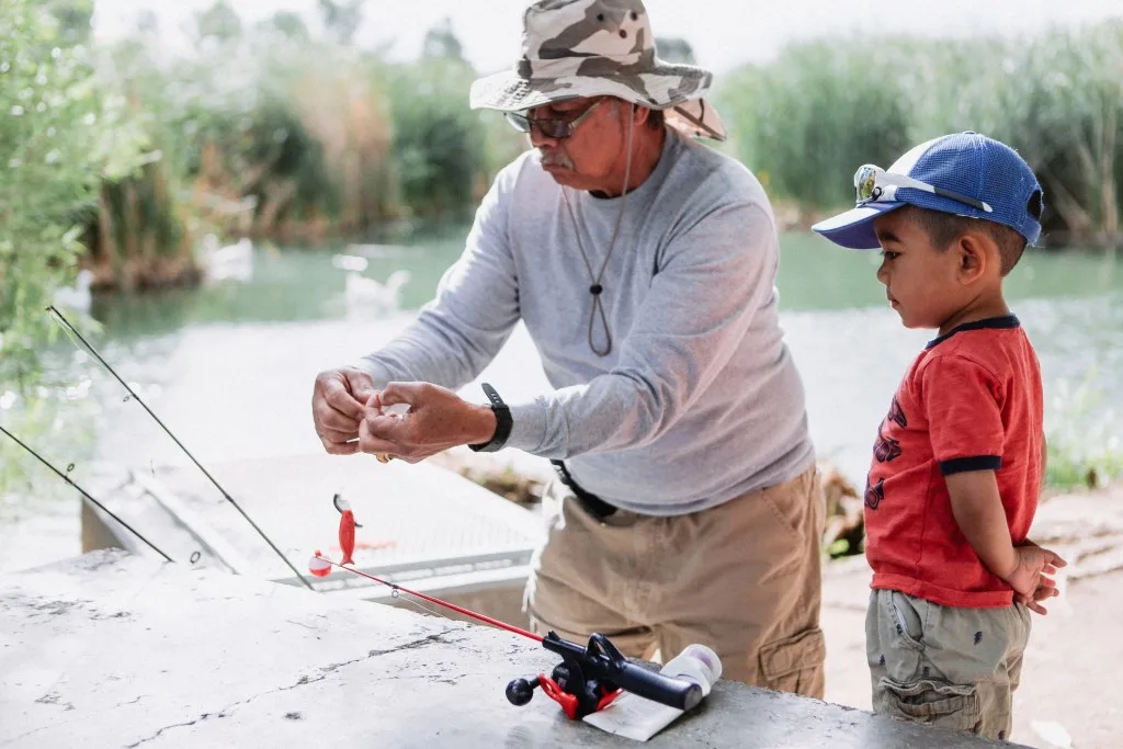 Grandpa and grandson fishing on Lake Roosevelt