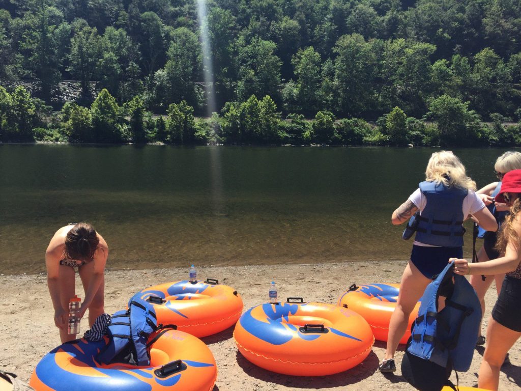 Group of friends tubing in the Delaware Water Gap