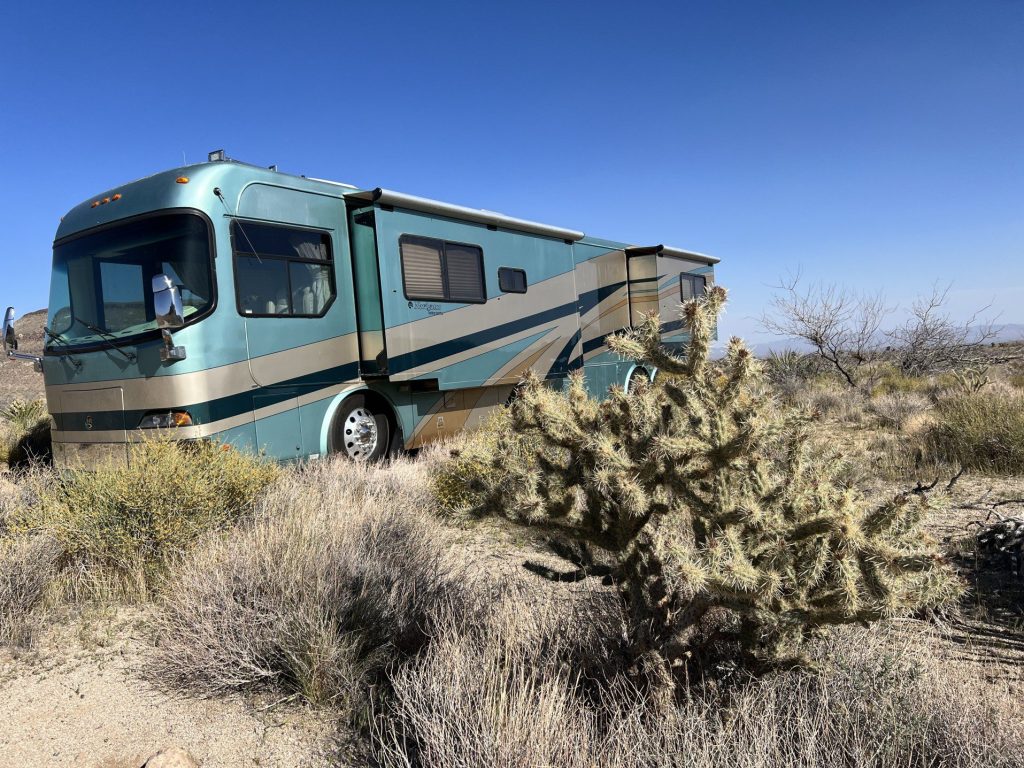 Motorcoach parked in desert while boondocking