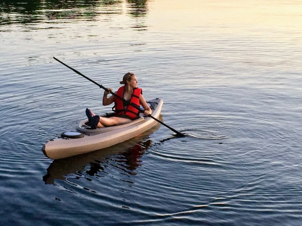 Woman kayaking on Lake Michigan