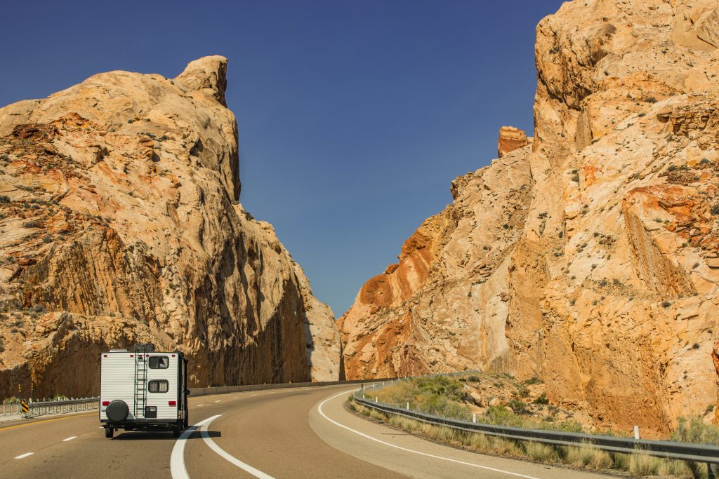 Truck towing RV uphill