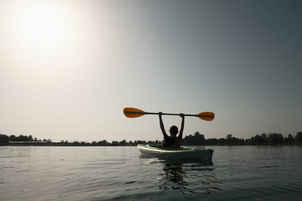 Boy kayaking in Green Bay