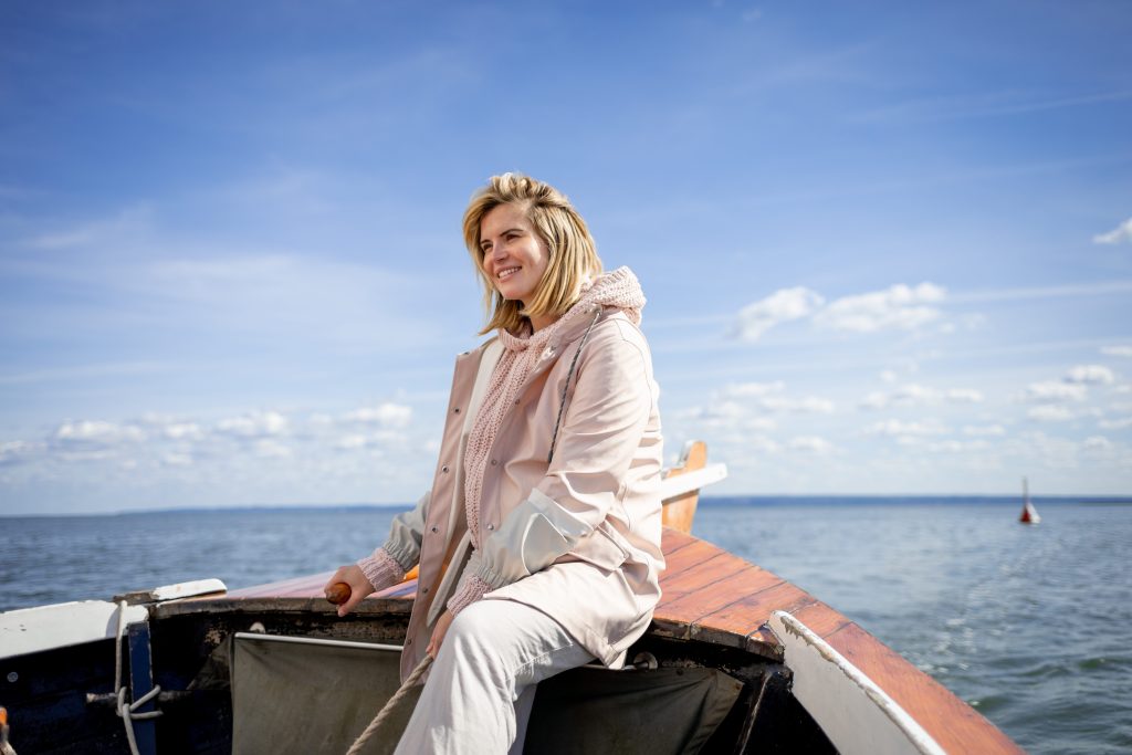Woman boating on Lake Champlain.