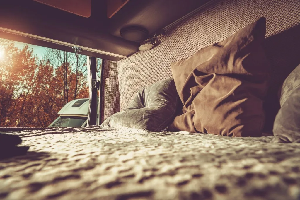 Interior of an RV bedroom on a cold fall day