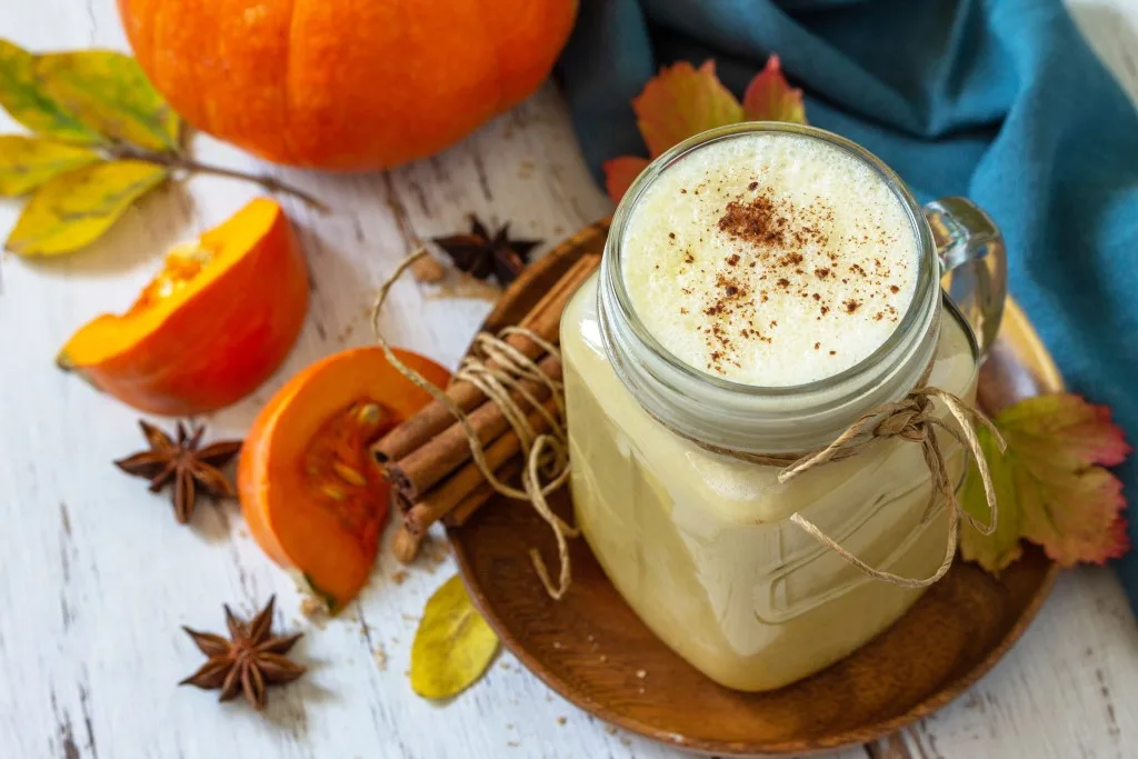 Pumpkin spiced drink in a mason jar