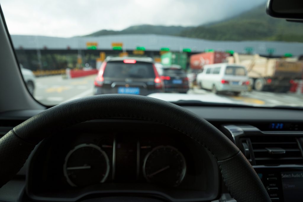RV driving through toll road