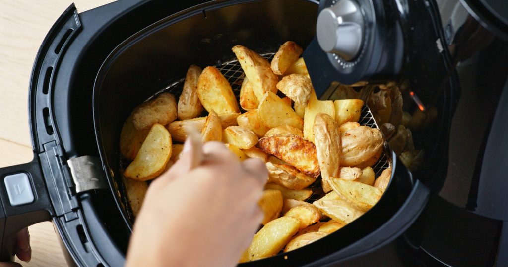 Potato wedges being made in an air fryer