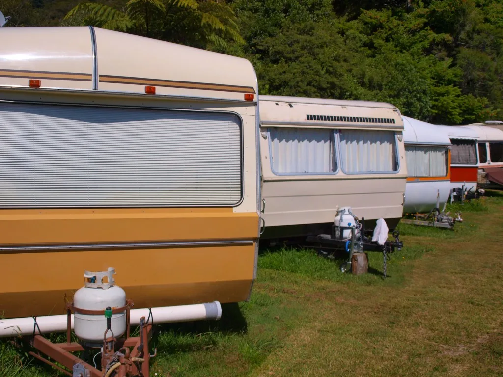 Campers unhitched at campsite