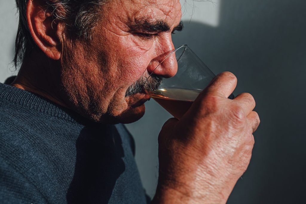 Man drinking Costco bourbon