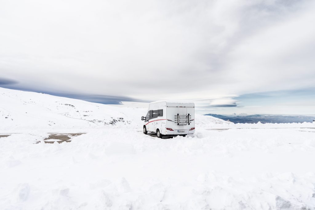 RV driving over the snow