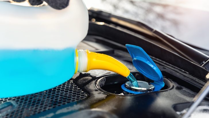 Pouring antifreeze into RV