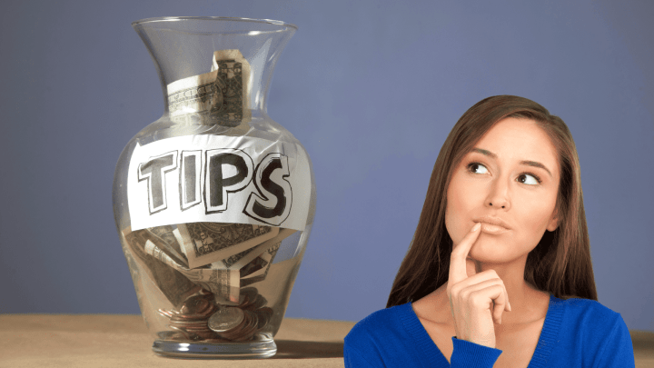 Woman considering tipping