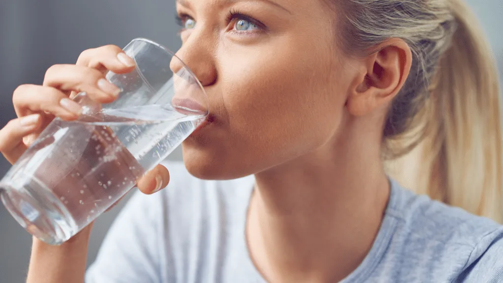 Woman drinking La Croix