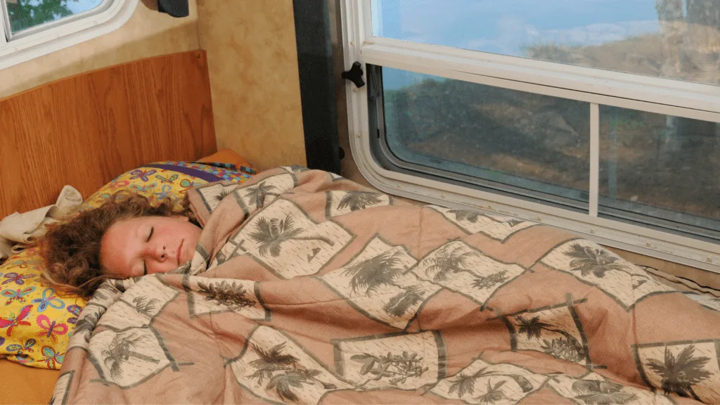 Woman sleeping in RV