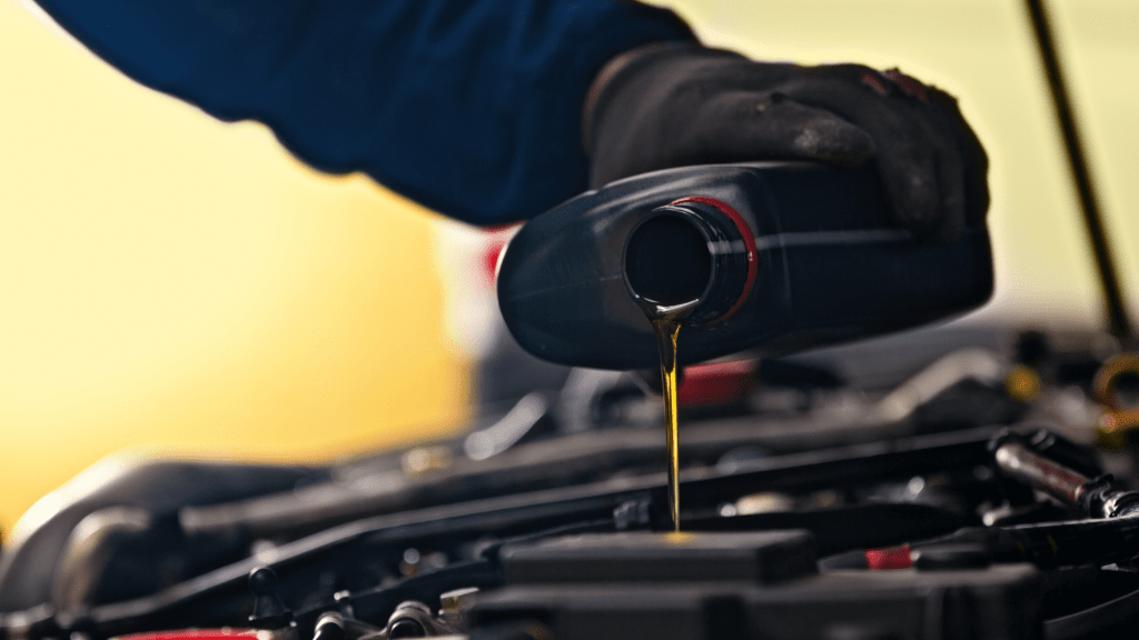 Mechanic doing oil change