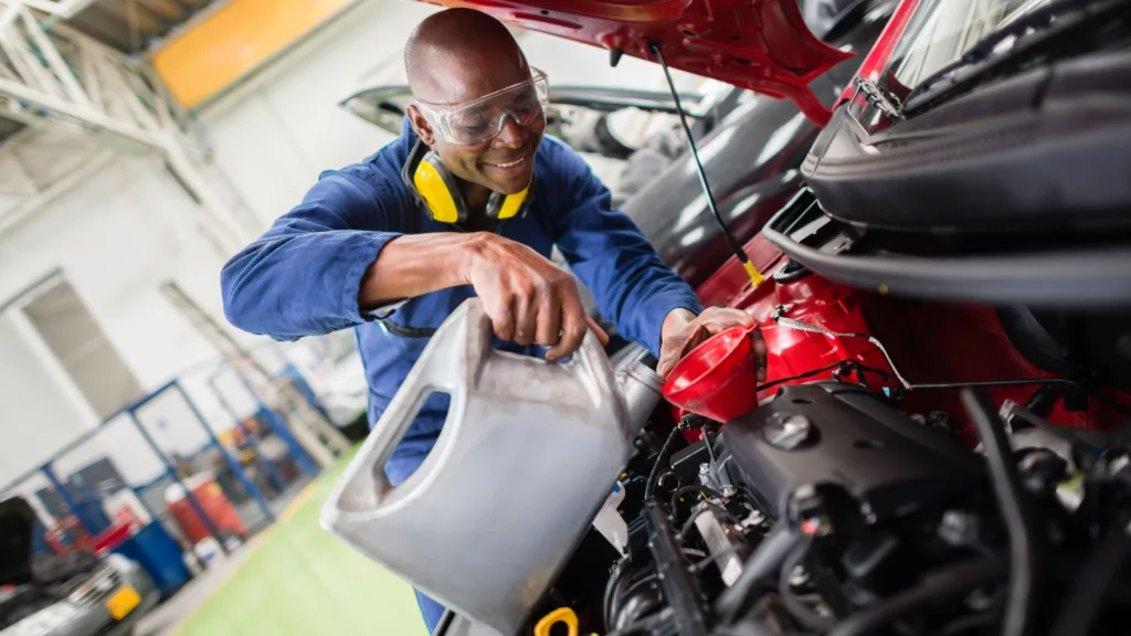 Take 5 mechanic doing oil change