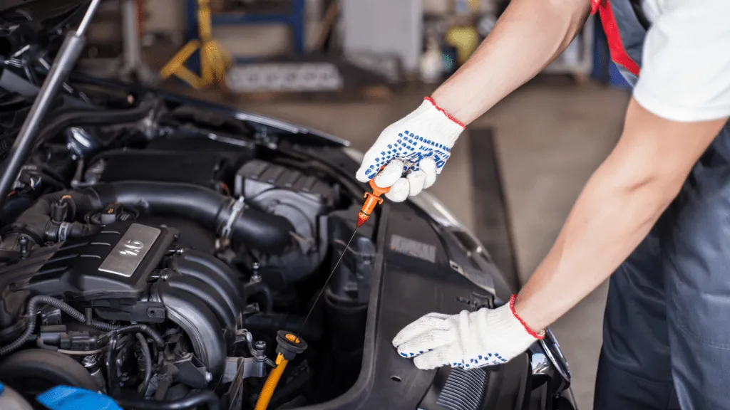 Checking vehicle for oil change 