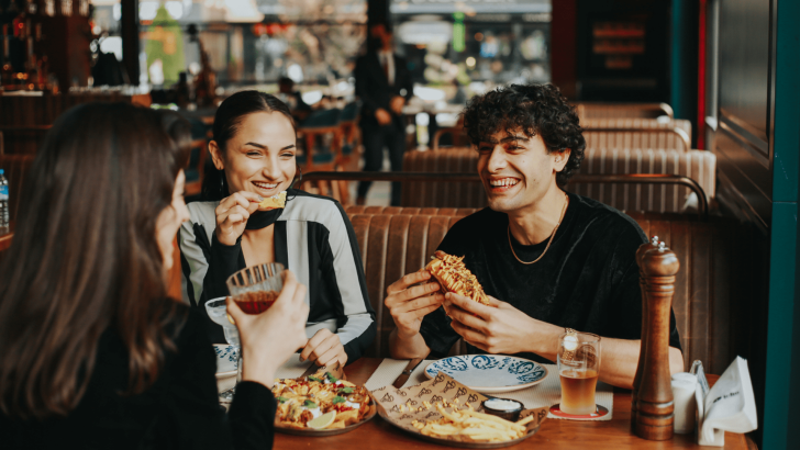 Friends eating in Albuquerque restaurant