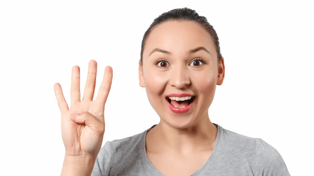 holding up four fingers