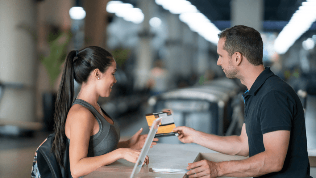 Woman signing up for gym membership